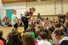 Ms. Little answers questions about Sage at the school assembly.