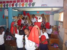 Grade 1 class in Pandy Town with their backpacks.