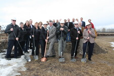 Town, County, School Division, Parents, Trustees and Builders turn out for the ceremonial ground-breaking.