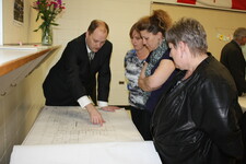 Onoway High Principal James Trodden walks guests through the new school blueprints.